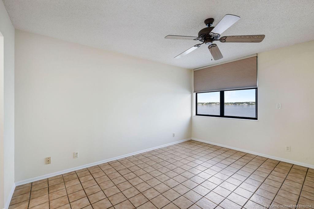 1950 Southwest Palm City Road, Unit 14302 Stuart, FL 34994 - Photo 30 of 62 a view of an empty room and window