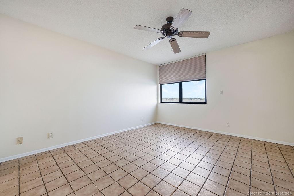 1950 Southwest Palm City Road, Unit 14302 Stuart, FL 34994 - Photo 31 of 62 a view of an empty room and window