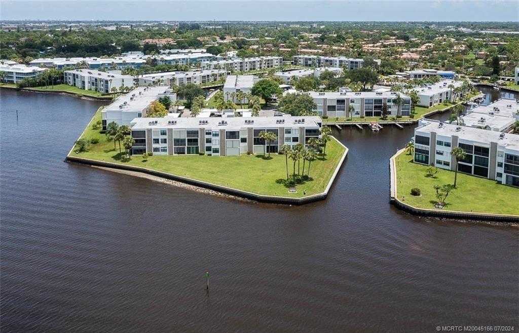 1950 Southwest Palm City Road, Unit 14302 Stuart, FL 34994 - Photo 46 of 62 an aerial view of a house with a ocean view