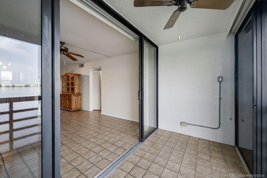 1950 Southwest Palm City Road, Unit 14302 Stuart, FL 34994 - Photo 8 of 62 a view of a hallway view with staircase