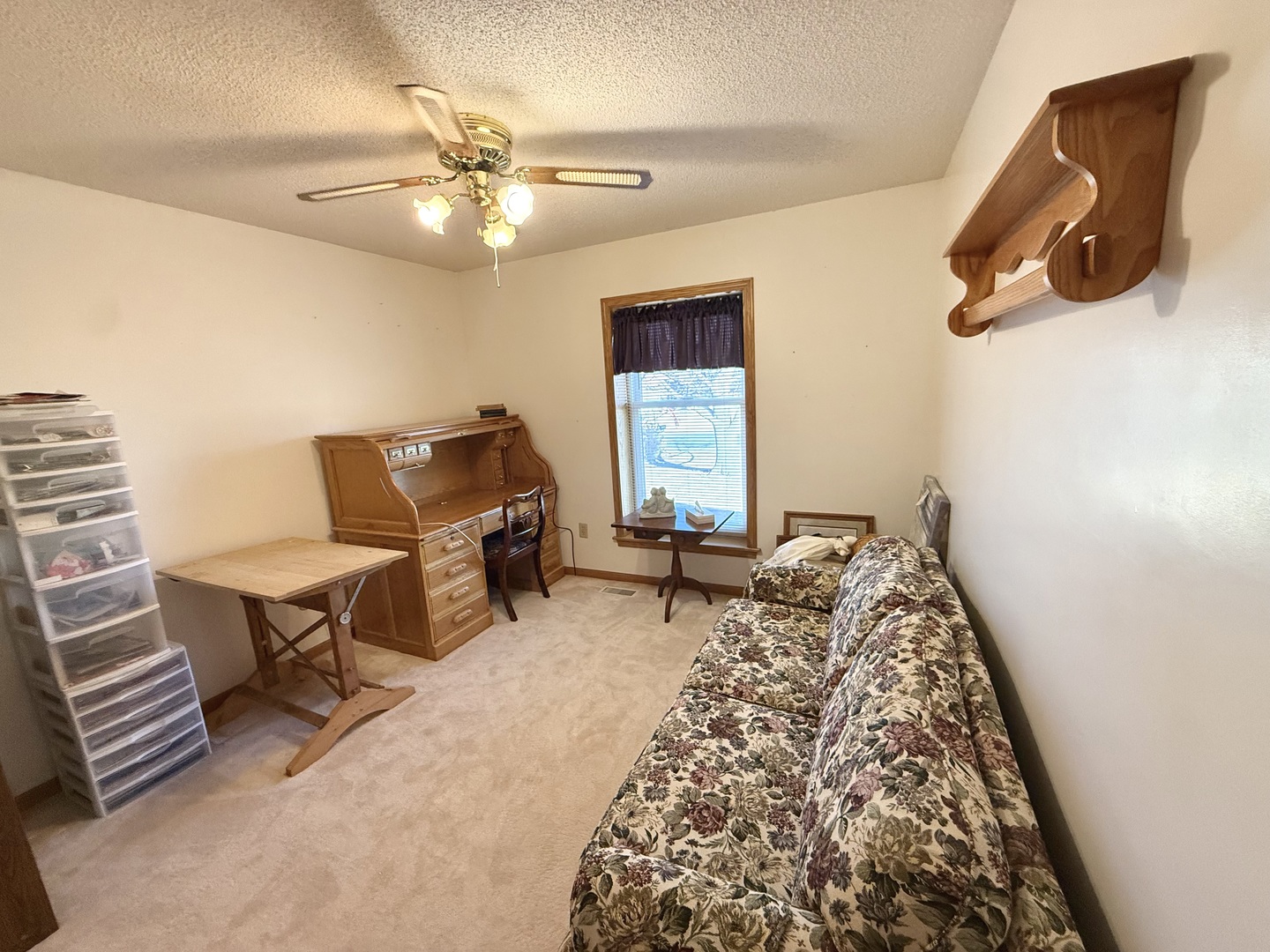 8408 49th Street Coal Valley, IL 61240 - Photo 32 of 43 a living room with furniture and a window