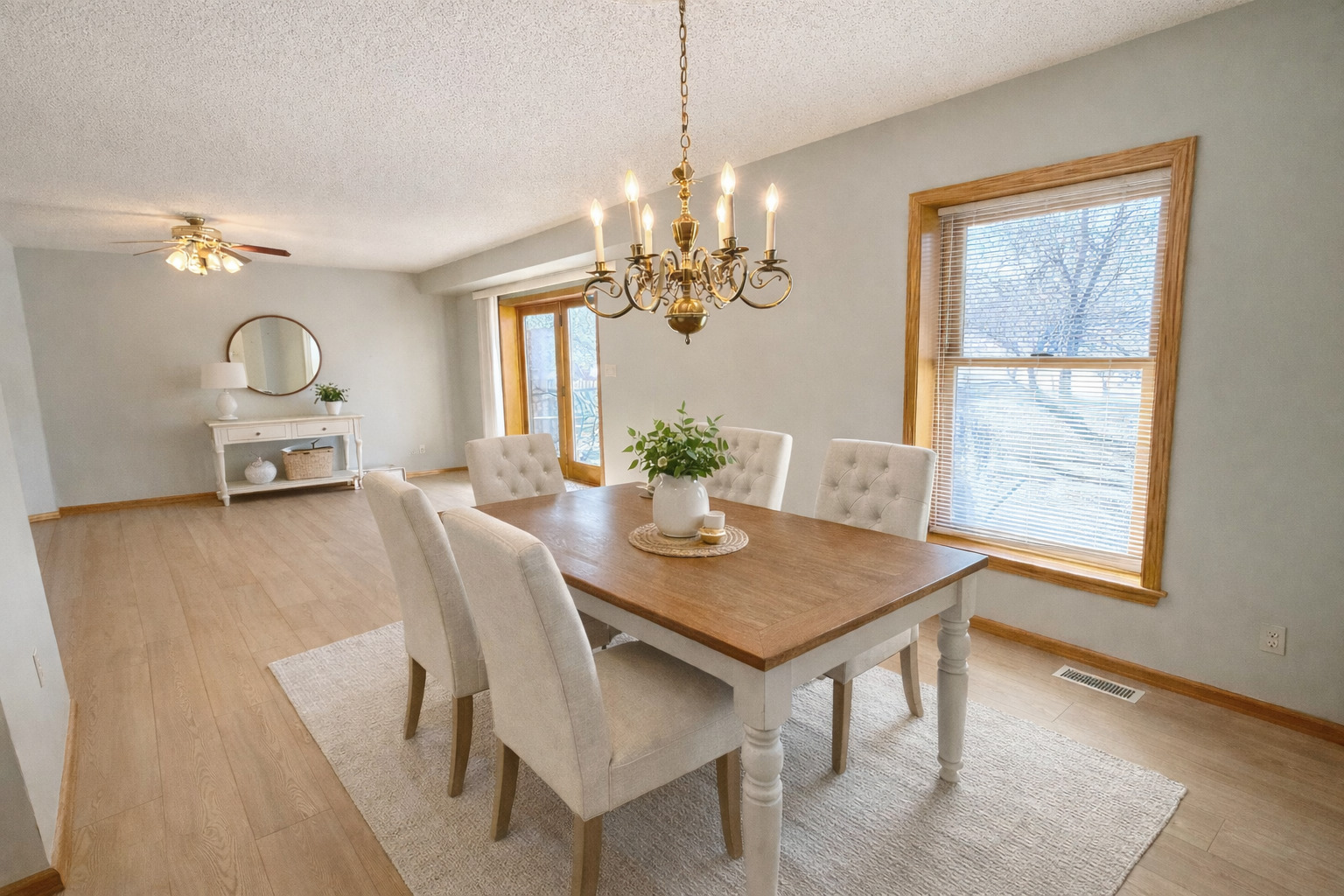 8408 49th Street Coal Valley, IL 61240 - Photo 4 of 43 a view of a dining room with furniture window and wooden floor