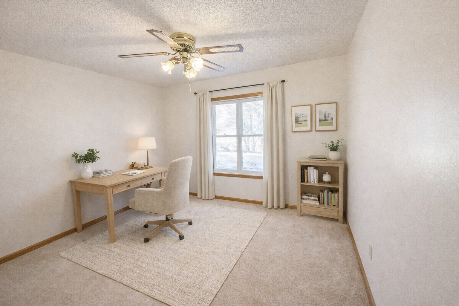 8408 49th Street Coal Valley, IL 61240 - Photo 8 of 43 a view of a workspace with furniture and a window