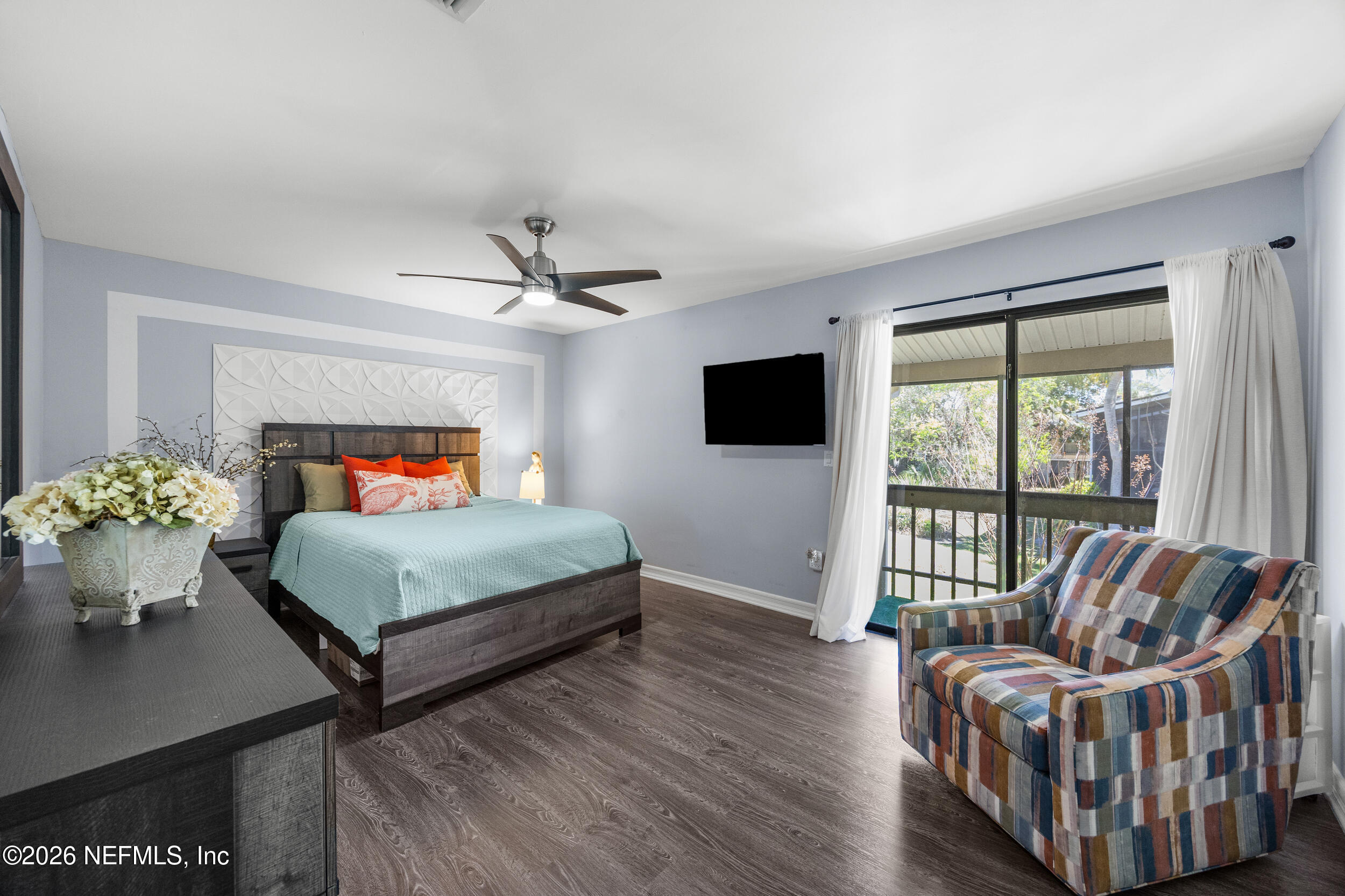 7852 Playa Del Rey Court Jacksonville, FL 32256 - Photo 17 of 33 a bedroom with furniture and a window