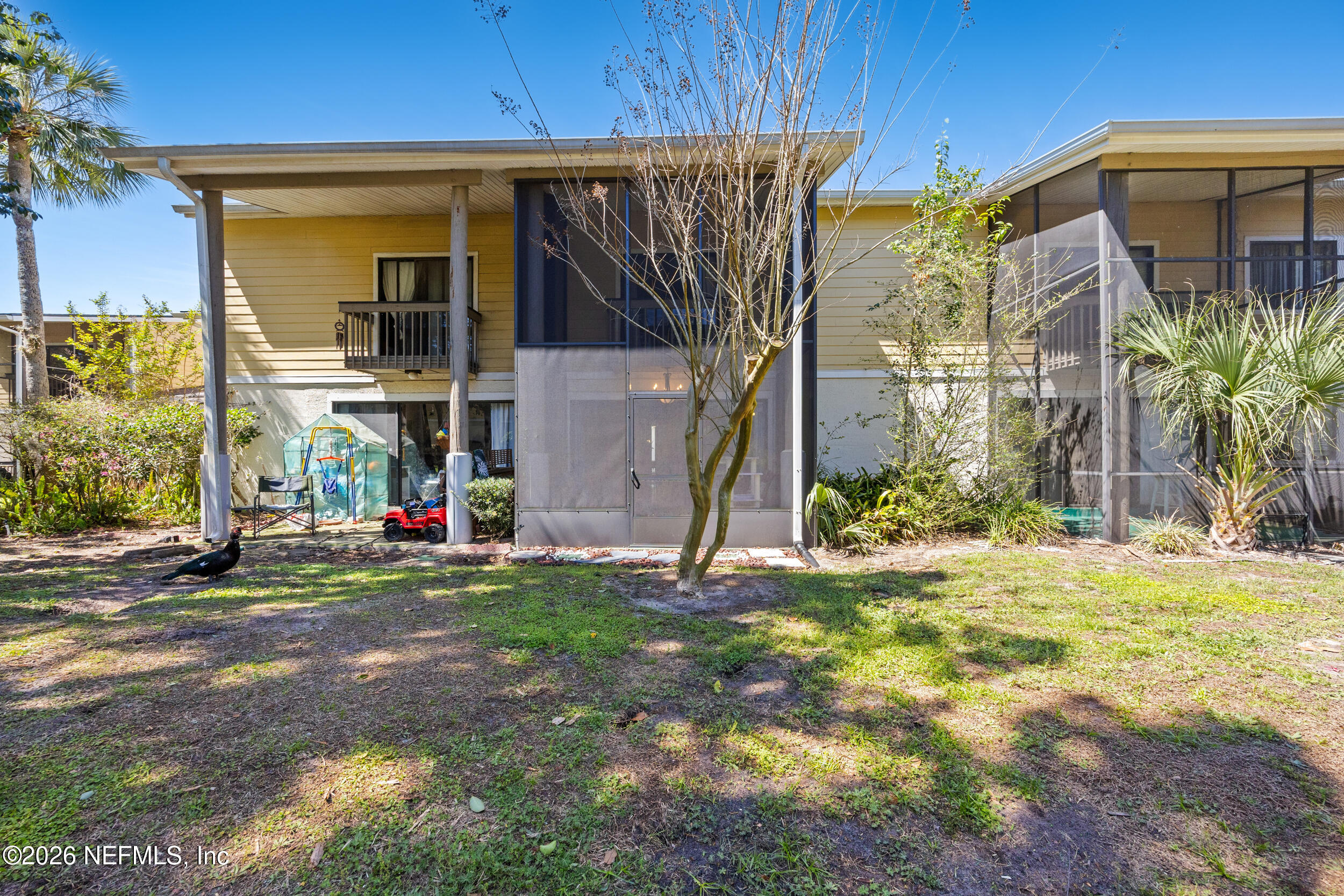 7852 Playa Del Rey Court Jacksonville, FL 32256 - Photo 28 of 33 a view of a house with backyard and entertaining space