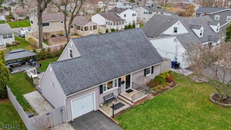 178 Tillotson Road Fanwood, NJ 07023 - Photo 2 of 38 an aerial view of a house with swimming pool and large trees