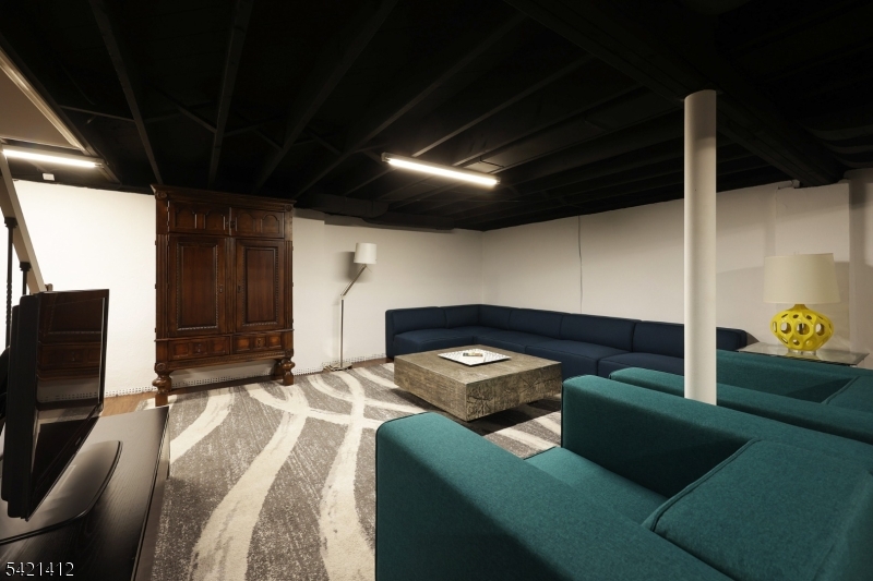 178 Tillotson Road Fanwood, NJ 07023 - Photo 22 of 38 a bedroom with furniture and a bed