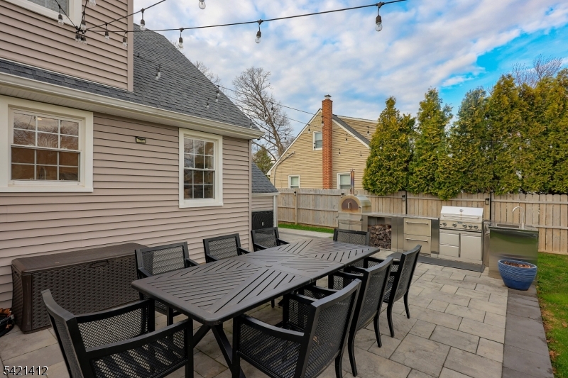 178 Tillotson Road Fanwood, NJ 07023 - Photo 30 of 38 a view of a dinning table and chairs in patio of the house