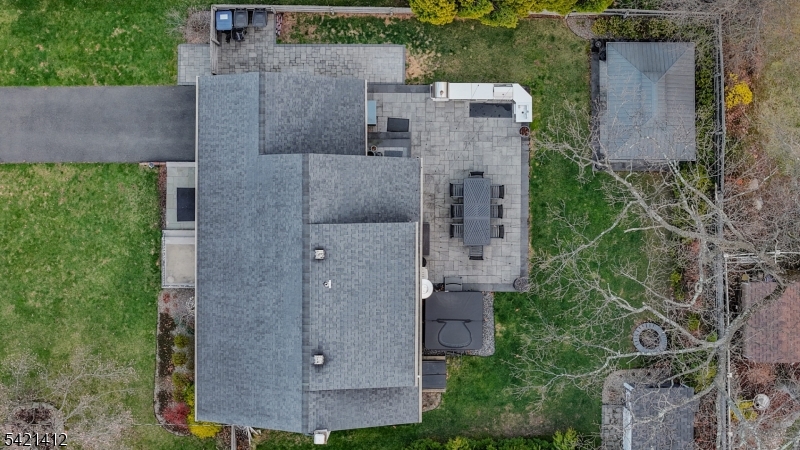 178 Tillotson Road Fanwood, NJ 07023 - Photo 37 of 38 an aerial view of a house with outdoor space and trees in the background