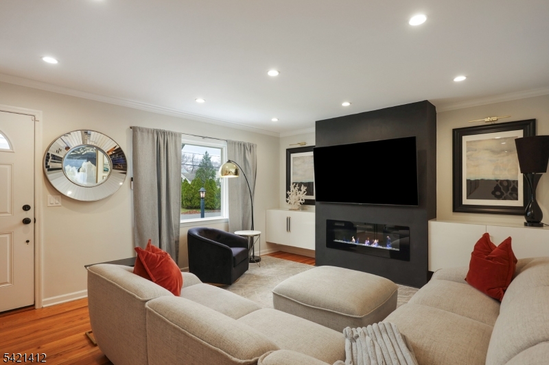 178 Tillotson Road Fanwood, NJ 07023 - Photo 5 of 38 a living room with furniture and a flat screen tv