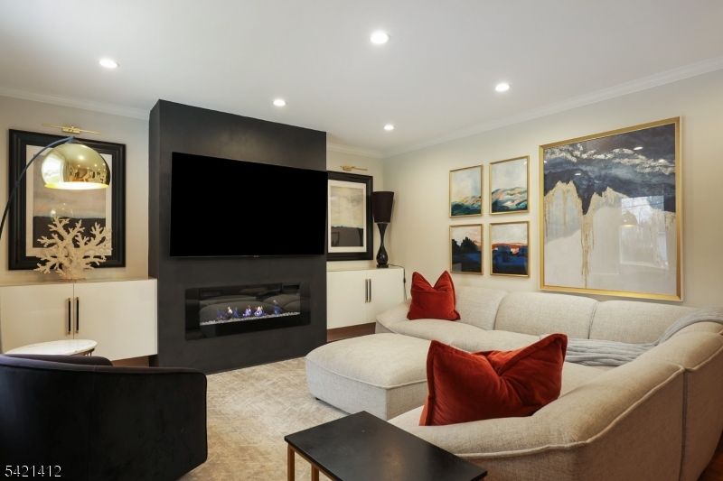 178 Tillotson Road Fanwood, NJ 07023 - Photo 6 of 38 a living room with furniture and a flat screen tv