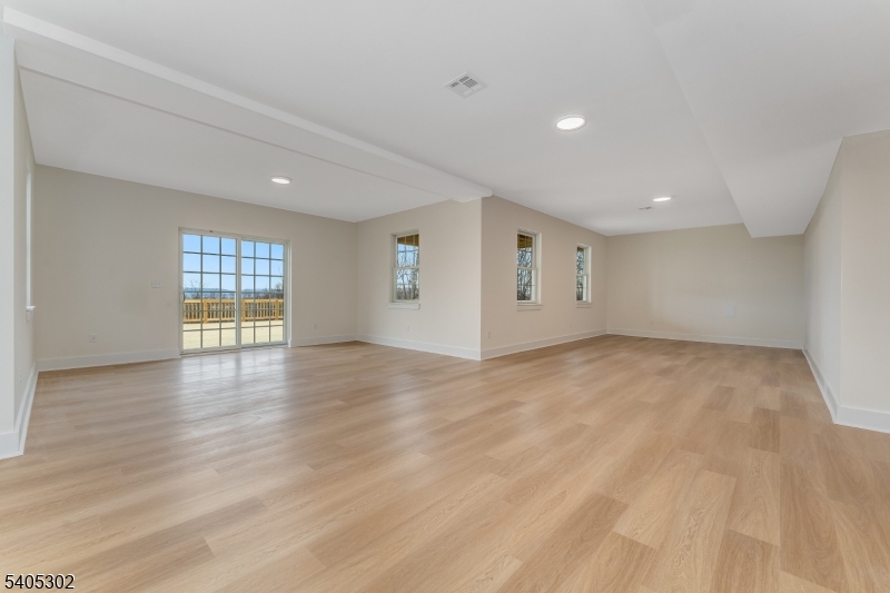 51 Staats Road Bloomsbury, NJ 08804 - Photo 30 of 45 a view of an empty room with wooden floor and glass door