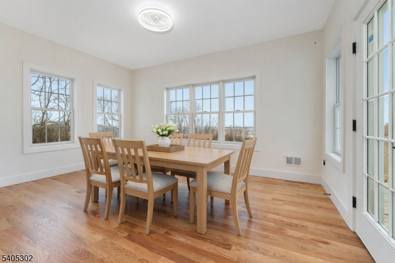 51 Staats Road Bloomsbury, NJ 08804 - Photo 3 of 45 a dining room with furniture and wooden floor