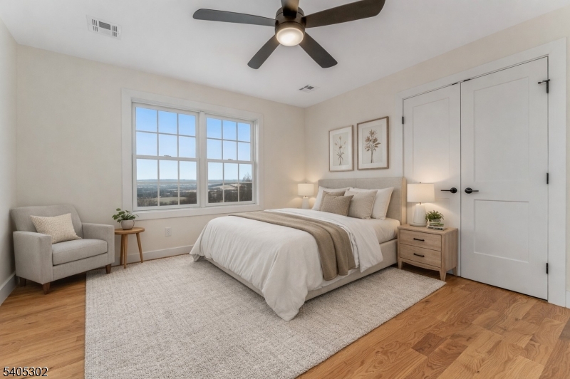 51 Staats Road Bloomsbury, NJ 08804 - Photo 39 of 45 a spacious bedroom with a bed and furniture