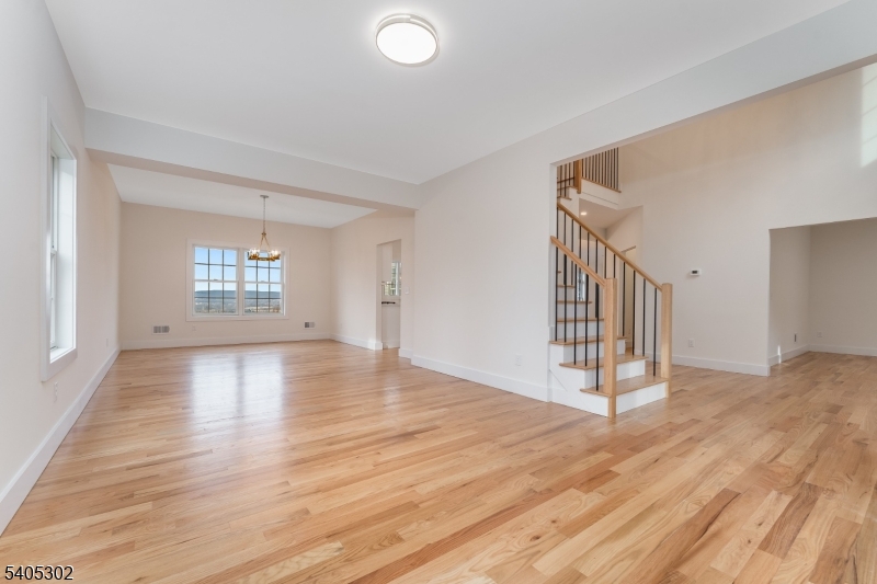 51 Staats Road Bloomsbury, NJ 08804 - Photo 8 of 45 a view of an empty room with wooden floor and a window