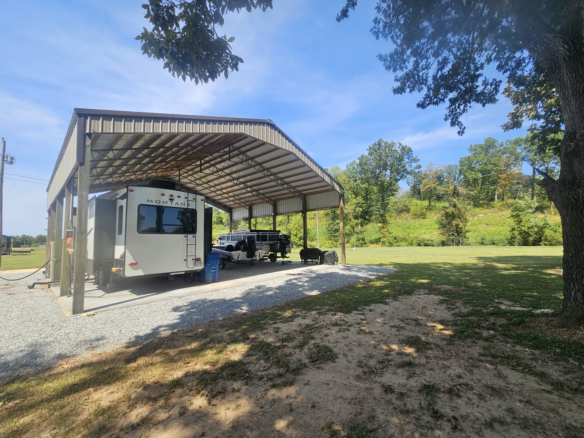 942 Lexi Lane Clifton, TN 38425 - Photo 21 of 33 a view of a house with backyard and a tree