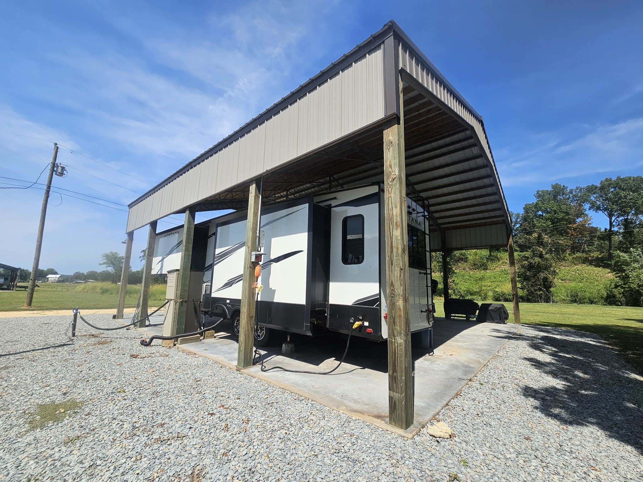 942 Lexi Lane Clifton, TN 38425 - Photo 4 of 33 a view of a house with backyard and sitting area