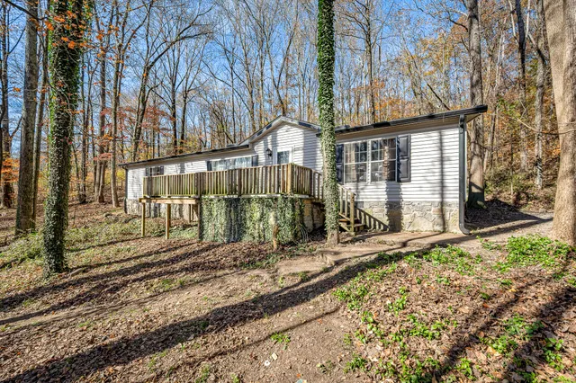 a view of a backyard of the house