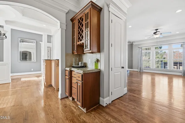 a bathroom with a shower sink and mirror