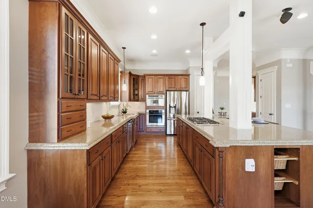 a swimming pool with outdoor seating and yard