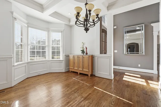 an aerial view of a house with outdoor space