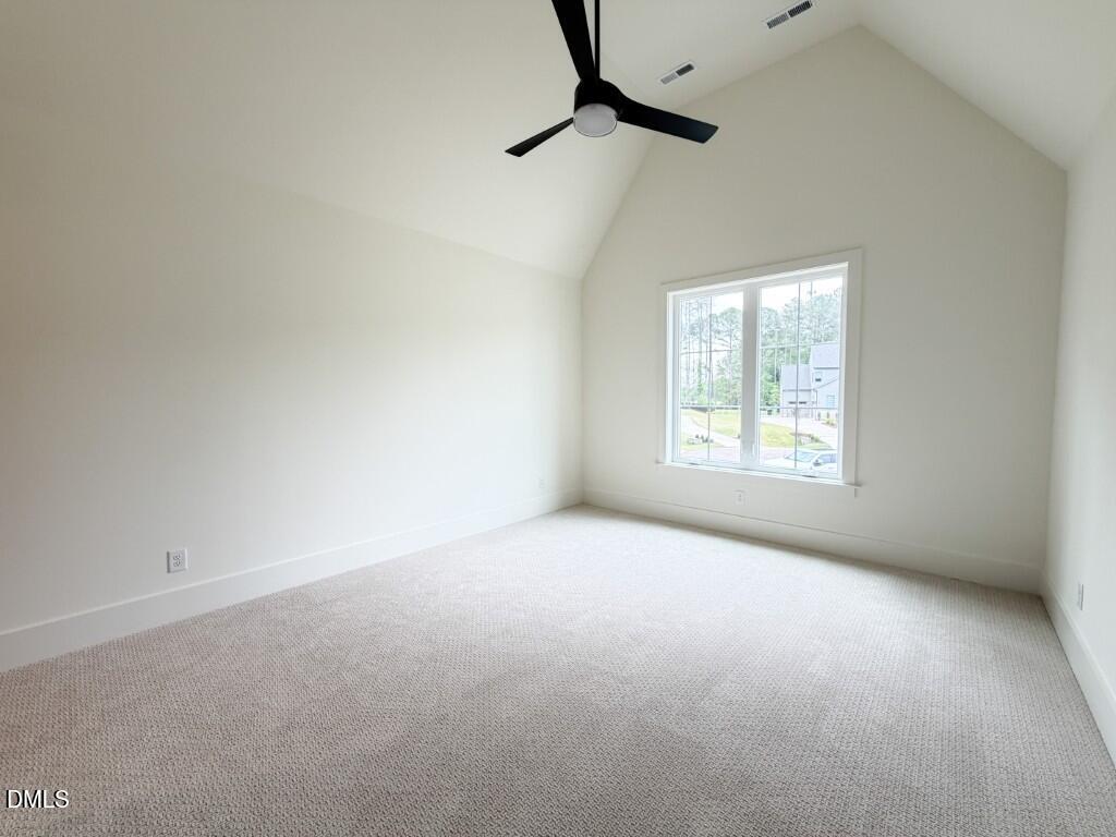 7441 Summer Tanager Trail Raleigh, NC 27614 - Photo 27 of 48 an empty room with windows