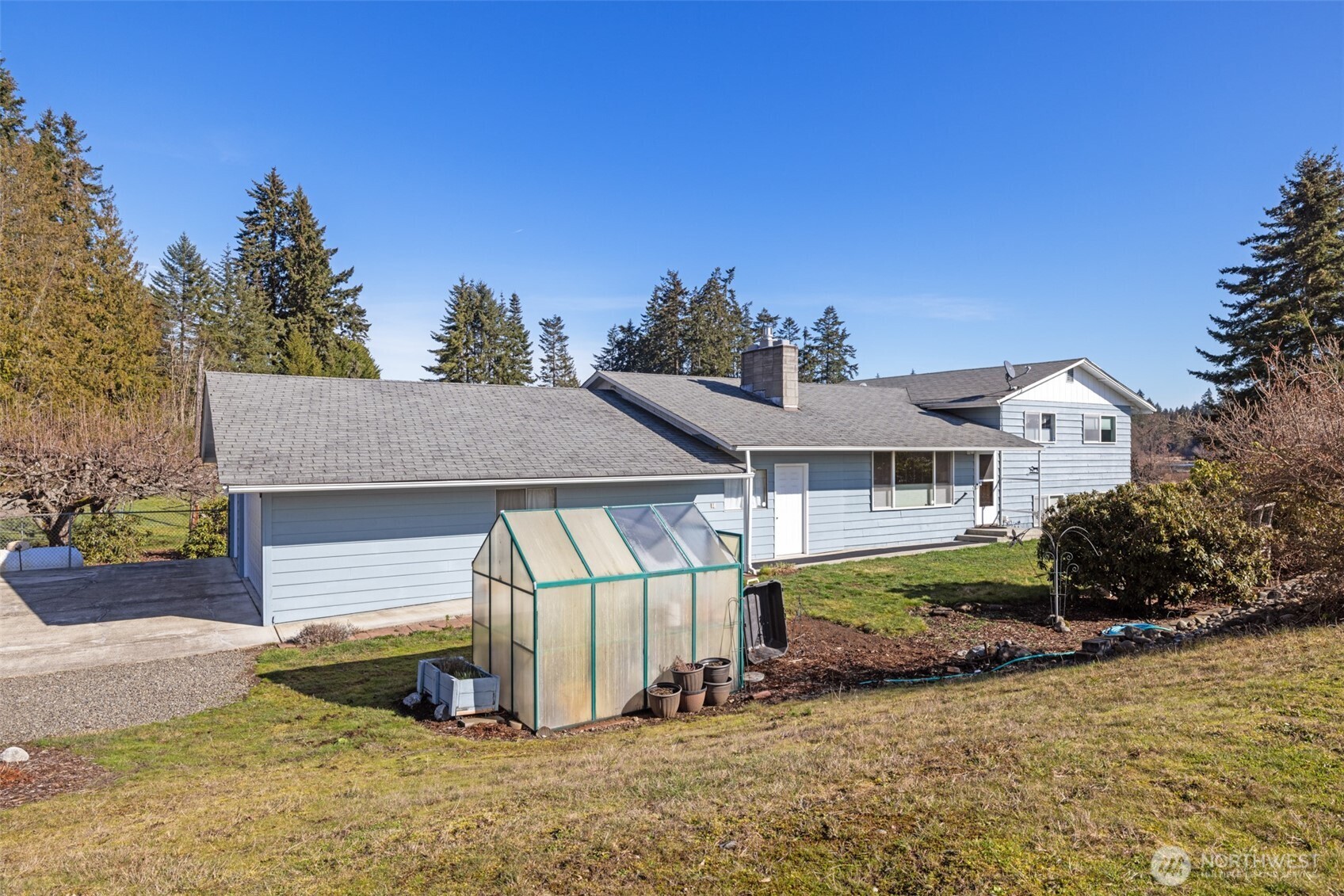 200 Lake Farm Road Port Angeles, WA 98362 - Photo 1 of 40 a front view of a house with a yard