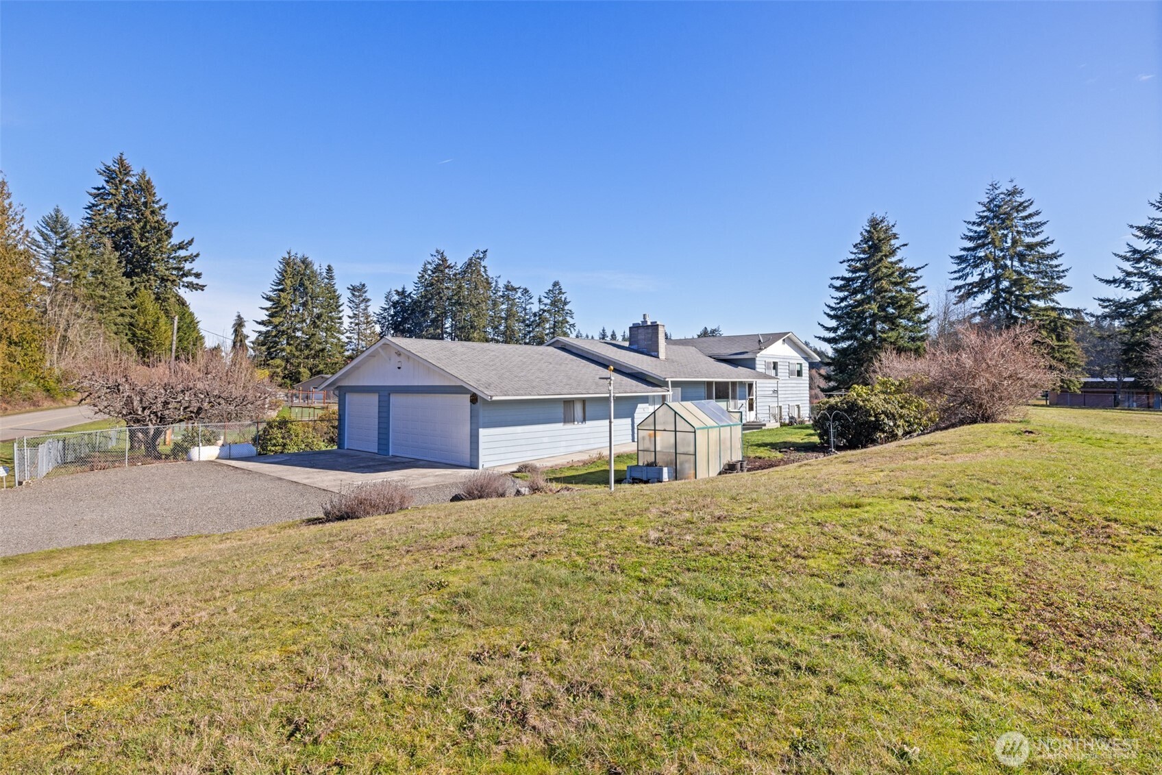 200 Lake Farm Road Port Angeles, WA 98362 - Photo 2 of 40 a front view of a house with a yard