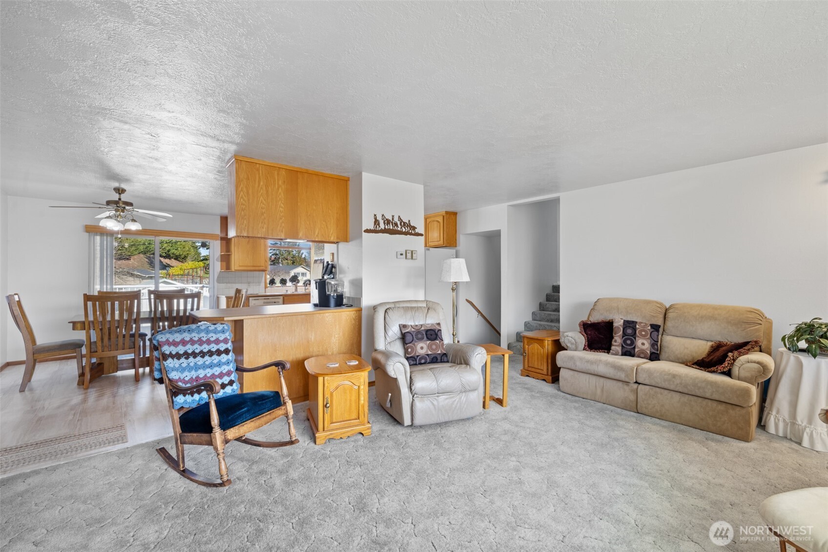 200 Lake Farm Road Port Angeles, WA 98362 - Photo 24 of 40 a living room with furniture and a fireplace