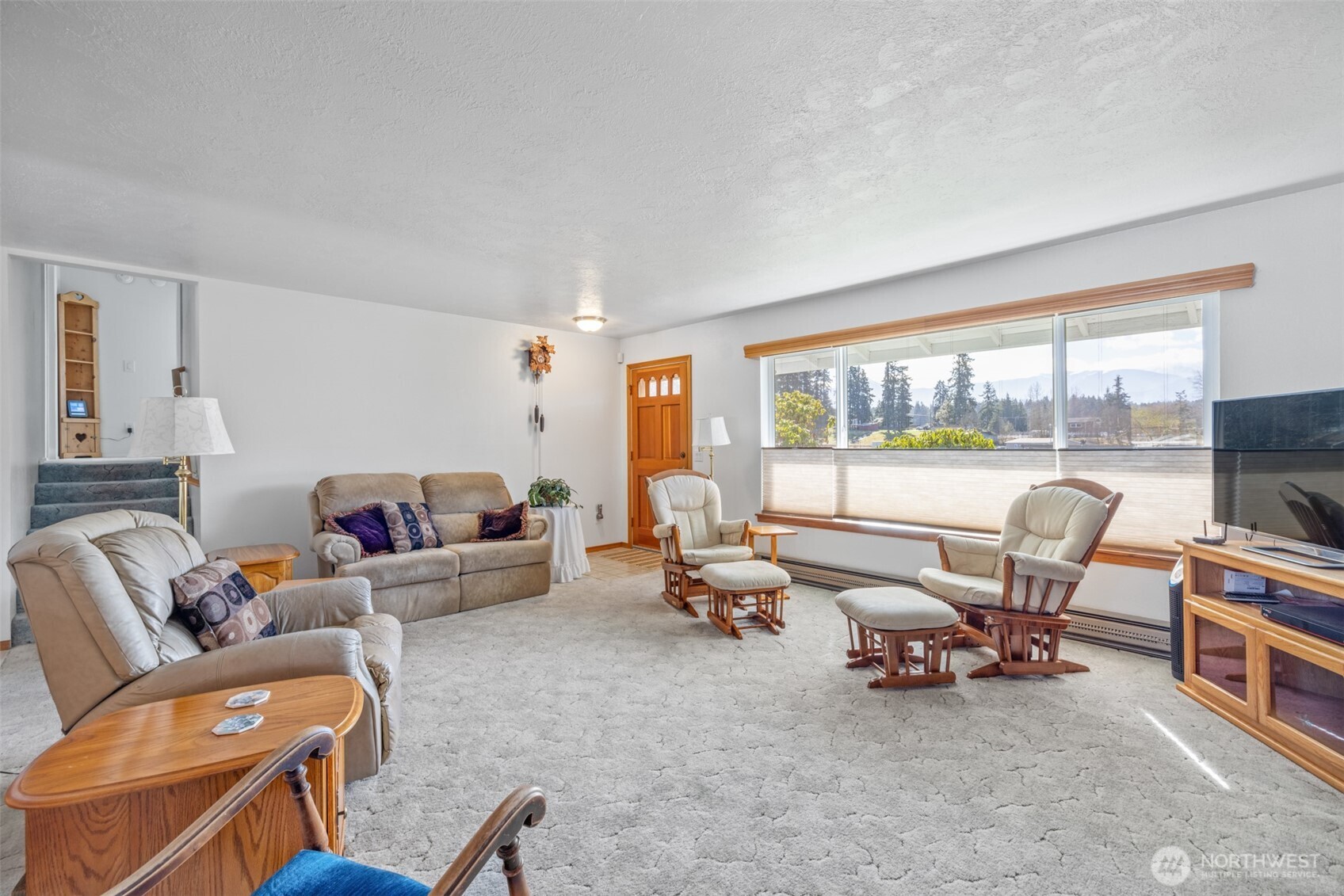 200 Lake Farm Road Port Angeles, WA 98362 - Photo 25 of 40 a living room with furniture and a floor to ceiling window