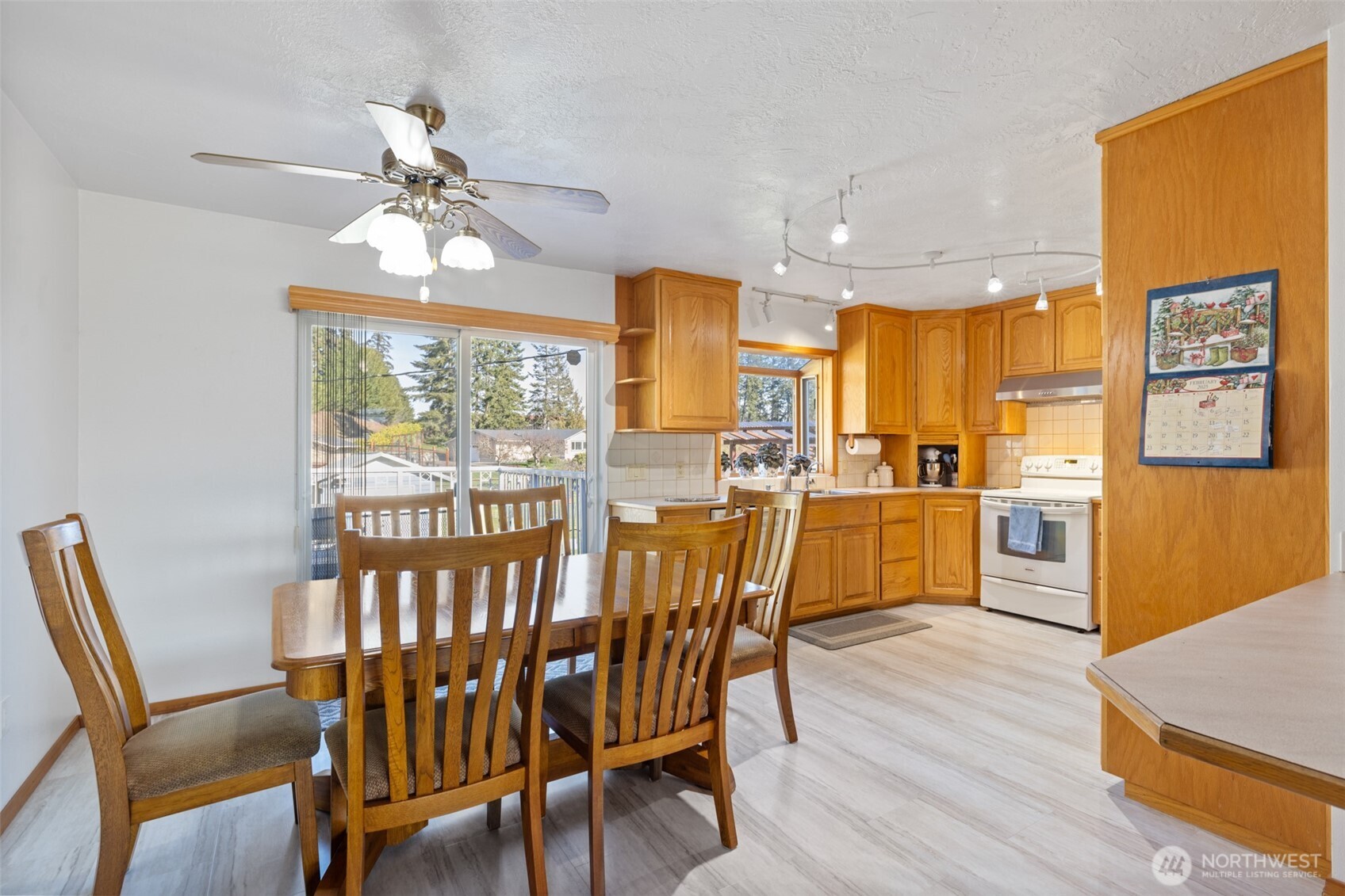 200 Lake Farm Road Port Angeles, WA 98362 - Photo 33 of 40 a view of a dining room with furniture window and wooden floor