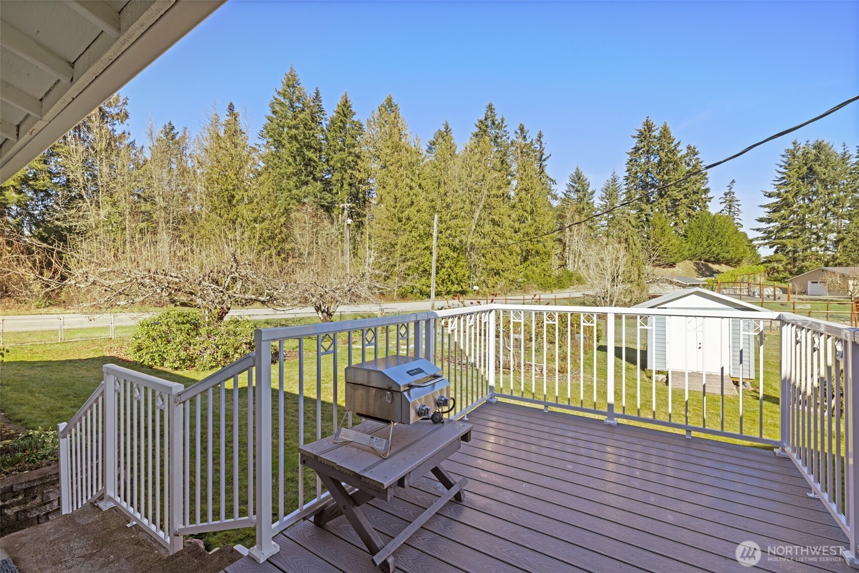 200 Lake Farm Road Port Angeles, WA 98362 - Photo 34 of 40 a view of a chair and table on the wooden floor