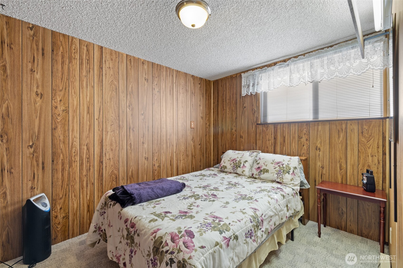 200 Lake Farm Road Port Angeles, WA 98362 - Photo 40 of 40 a bedroom with a bed and a window