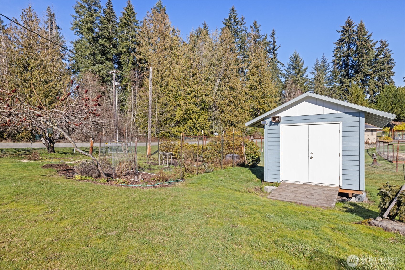 200 Lake Farm Road Port Angeles, WA 98362 - Photo 9 of 40 a front view of a house with garden