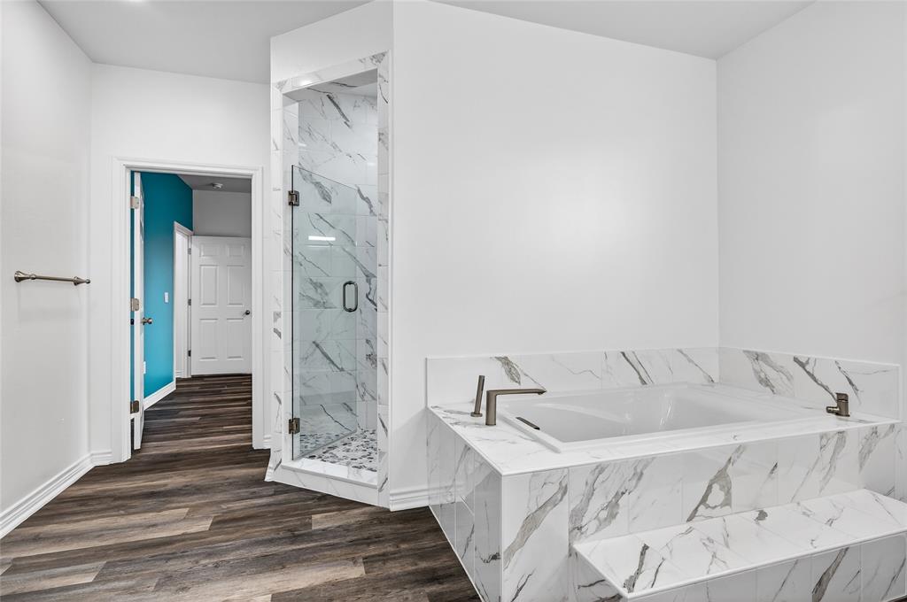 1809 Bluebonnet Avenue Denison, TX 75020 - Photo 25 of 40 a bathroom with a sink and a mirror