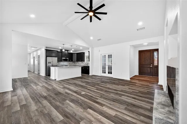 a view of a kitchen with sink and cabinet