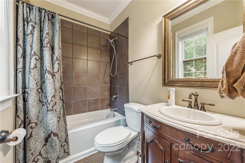 15501 Eagleview Drive Charlotte, NC 28278 - Photo 17 of 40 a bathroom with a sink toilet and shower