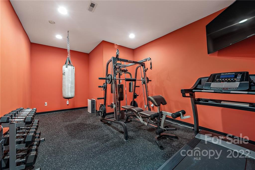 15501 Eagleview Drive Charlotte, NC 28278 - Photo 21 of 40 a view of a room with gym equipment