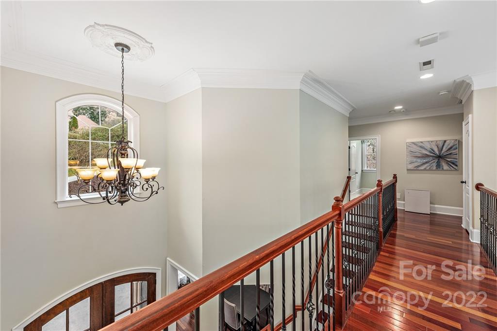 15501 Eagleview Drive Charlotte, NC 28278 - Photo 24 of 40 a view of entryway and hall with wooden floor