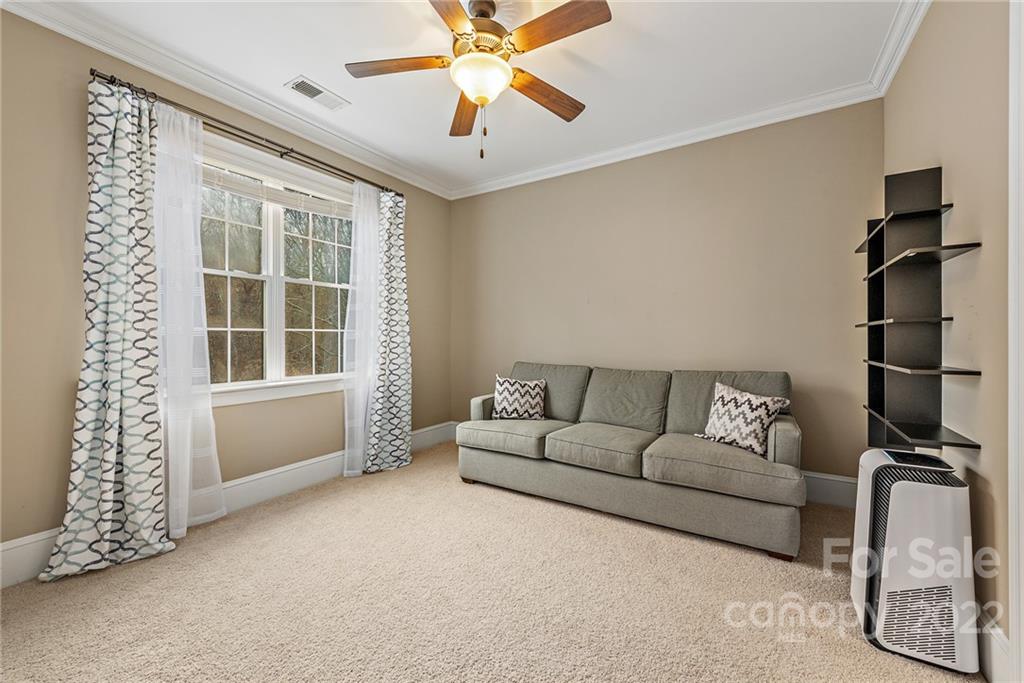 15501 Eagleview Drive Charlotte, NC 28278 - Photo 33 of 40 a living room with furniture and a window