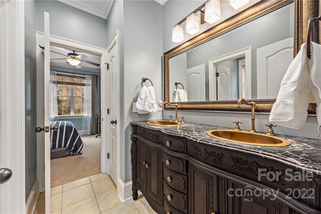 15501 Eagleview Drive Charlotte, NC 28278 - Photo 34 of 40 a bathroom with a sink and a mirror