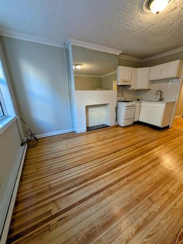 504 Court Street, Unit 1 Hoboken, NJ 07030 - Photo 3 of 12 a view of a room with wooden floor