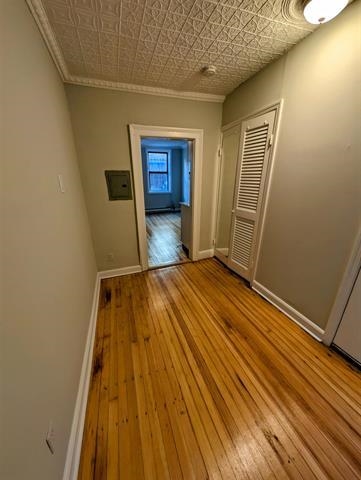 504 Court Street, Unit 1 Hoboken, NJ 07030 - Photo 5 of 12 a view of a room with wooden floor and staircase