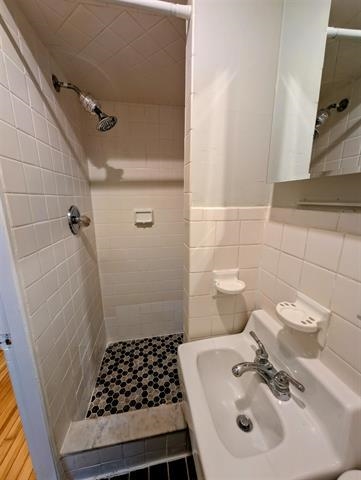504 Court Street, Unit 1 Hoboken, NJ 07030 - Photo 7 of 12 a bathroom with a sink toilet and shower