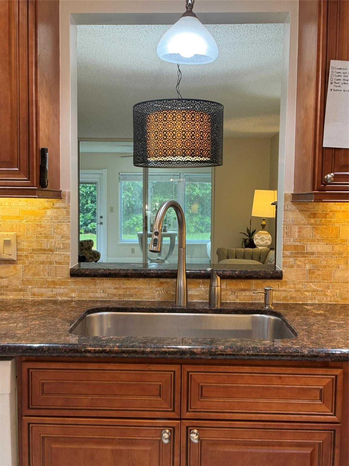 9245 Flynn Circle, Unit 8 Boca Raton, FL 33496 - Photo 16 of 36 a bathroom with a sink and a mirror