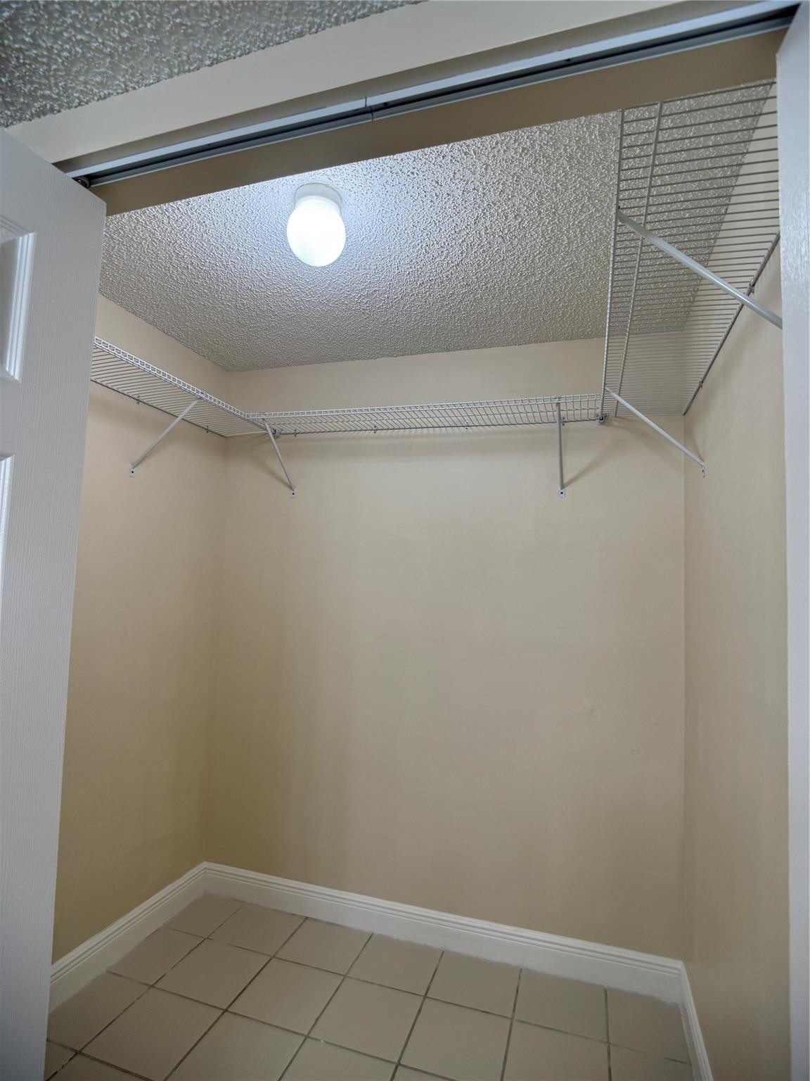 9245 Flynn Circle, Unit 8 Boca Raton, FL 33496 - Photo 26 of 36 a view of closet