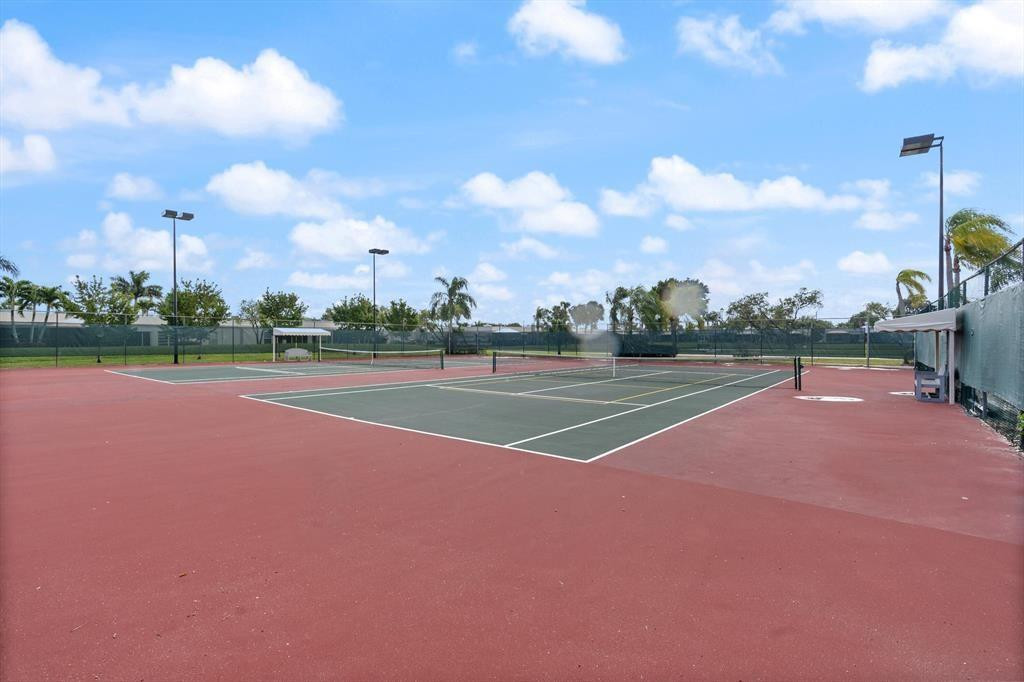 9245 Flynn Circle, Unit 8 Boca Raton, FL 33496 - Photo 36 of 36 a view of a tennis court