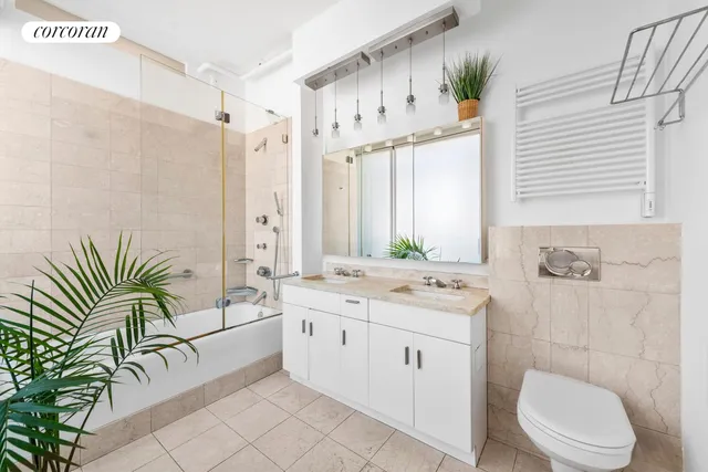 a living room with a table and chairs