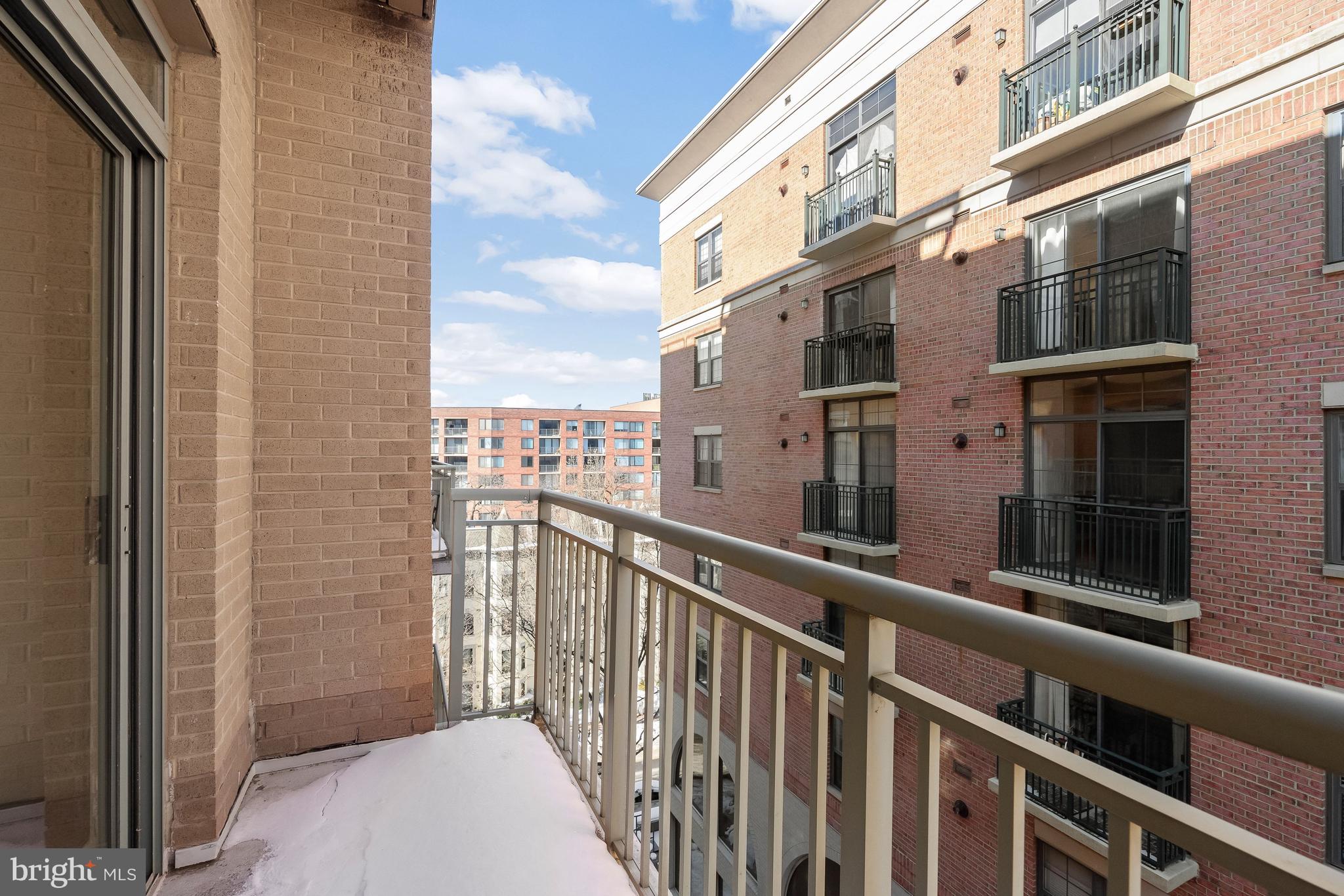 2425 L Street Northwest, Unit 709 Washington, DC 20037 - Photo 16 of 24 a view of a balcony with an outdoor space
