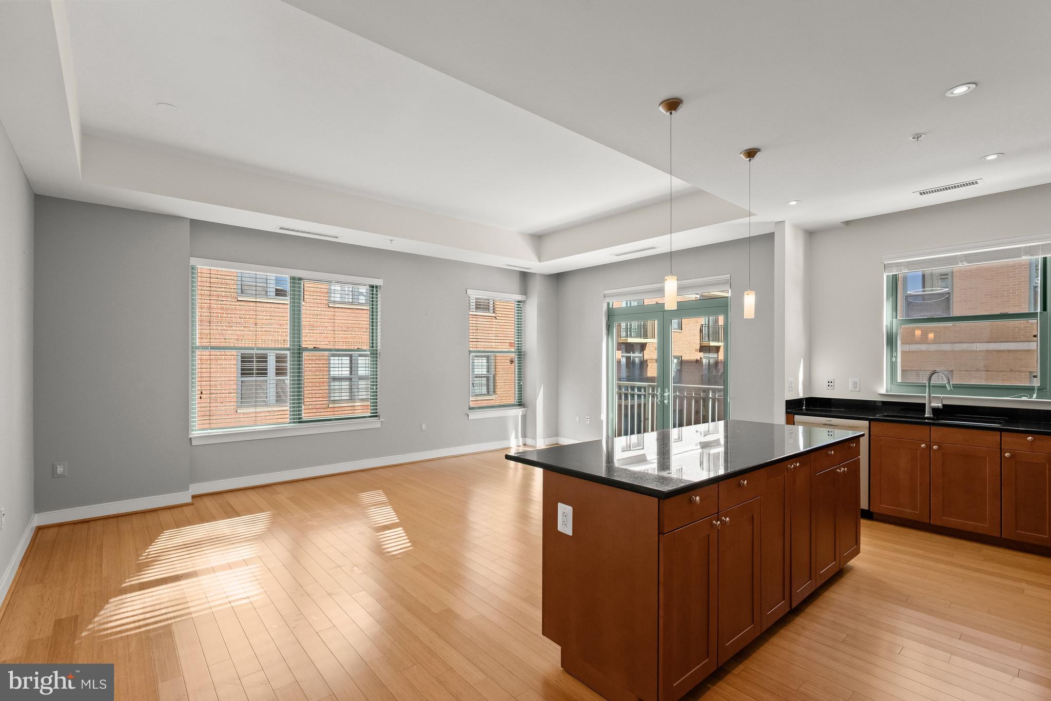 2425 L Street Northwest, Unit 709 Washington, DC 20037 - Photo 6 of 24 a view of a kitchen counter top space